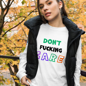 Women outside wearing a Long Sleeve T-shirt with Don't Care Printed on the front.